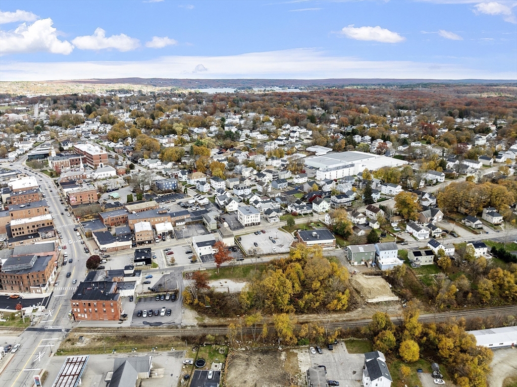 40 High Street Webster, MA 01570 - Photo 9 of 20 an aerial view of residential building with parking space