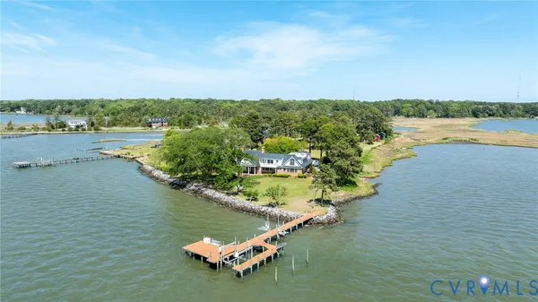 a view of a lake with a yard