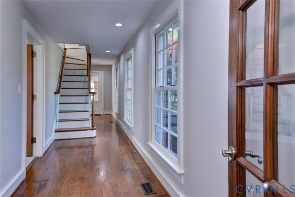 a room with furniture and a large window