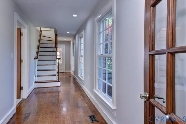 a room with furniture and a large window