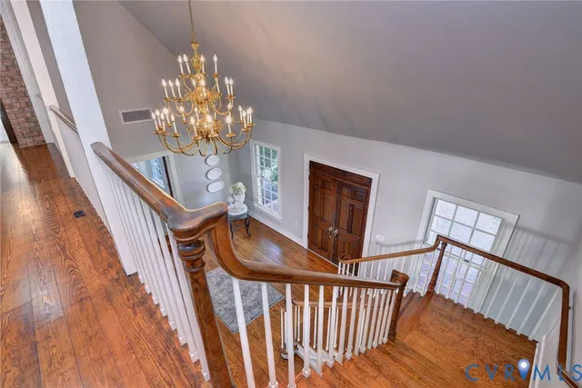 a view of a hallway view with staircase