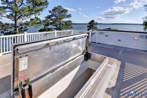 a view of a balcony with an ocean view