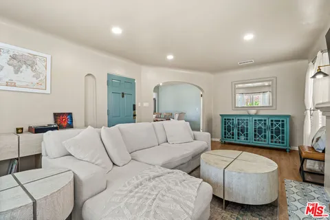 a living room with furniture and a couch