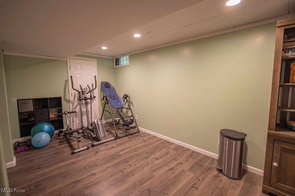 2121 South Cleveland Massillon Road Akron, OH 44321 - Photo 21 of 26 Exercise area featuring hardwood / wood-style flooring and ornamental molding