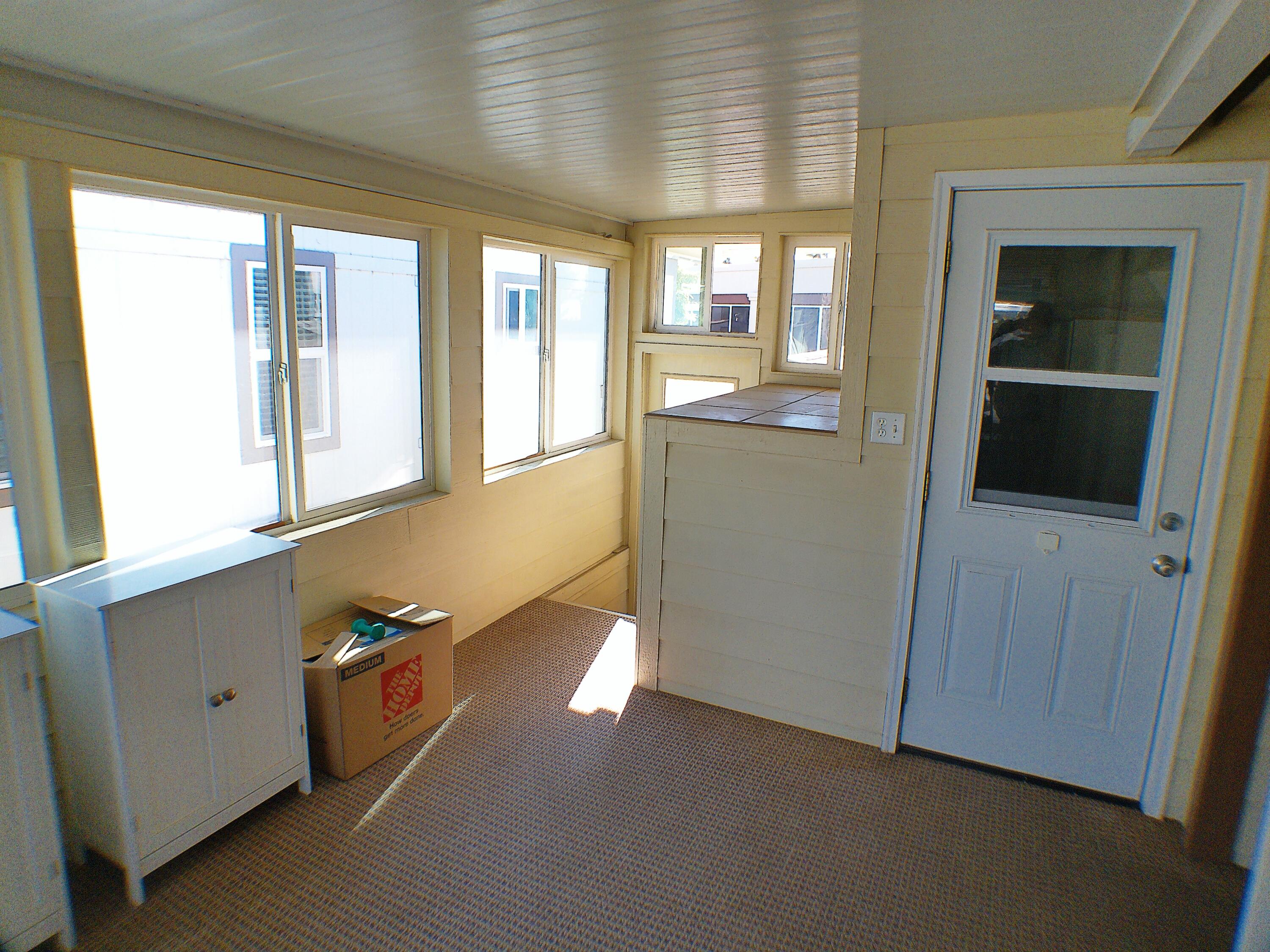 84136 Ave 44, Unit 477 Indio, CA 92203 - Photo 20 of 24 a view of an empty room with a window