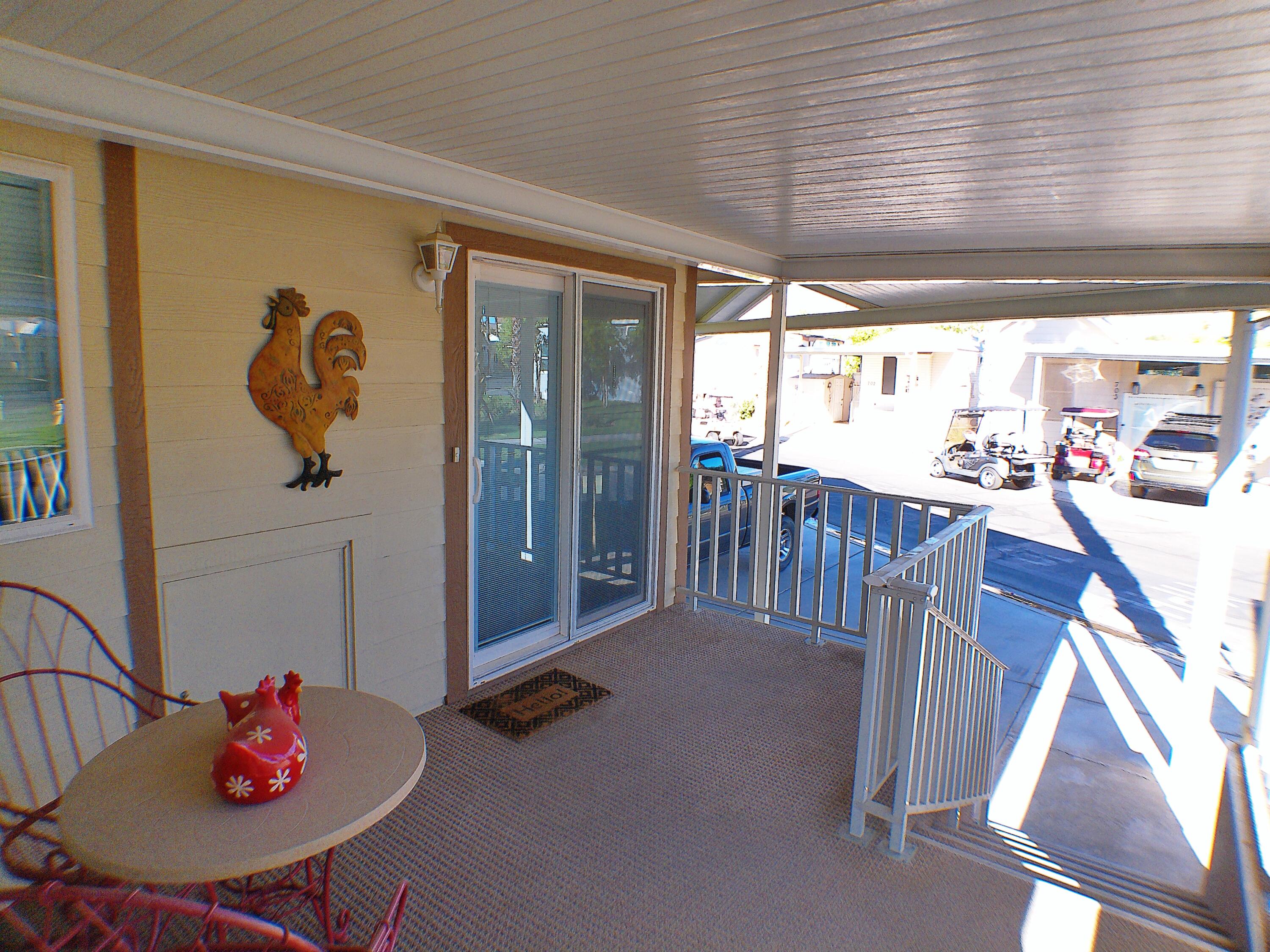 84136 Ave 44, Unit 477 Indio, CA 92203 - Photo 23 of 24 a living room with furniture and a window