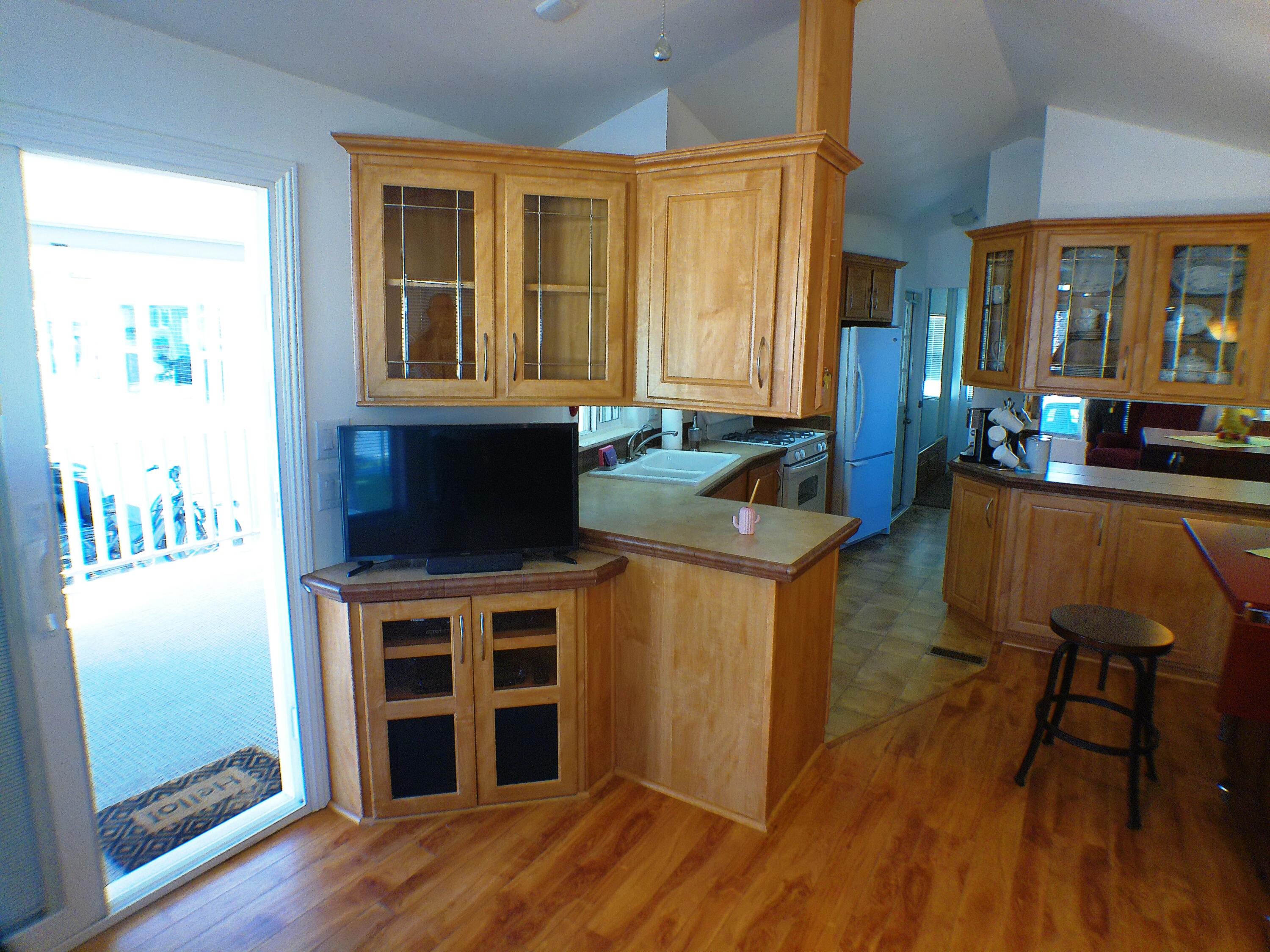 84136 Ave 44, Unit 477 Indio, CA 92203 - Photo 8 of 24 a living room with furniture and a fireplace