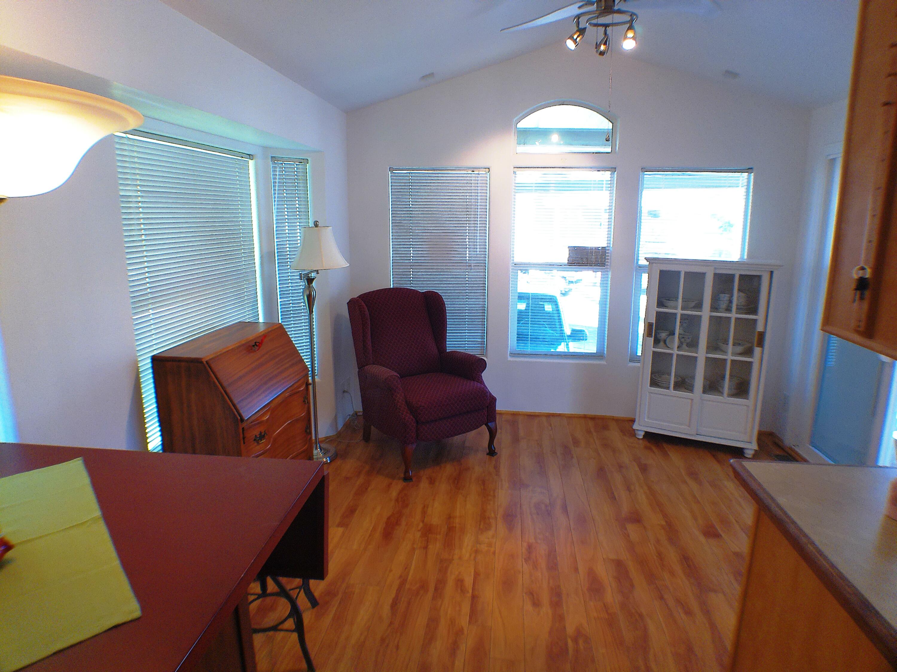 84136 Ave 44, Unit 477 Indio, CA 92203 - Photo 10 of 24 a living room with furniture and a window
