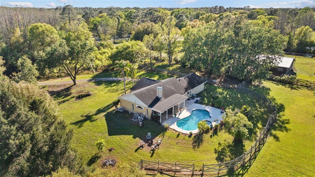 7213 Jones Road Odessa, FL 33556 - Photo 1 of 1 an aerial view of residential houses with outdoor space