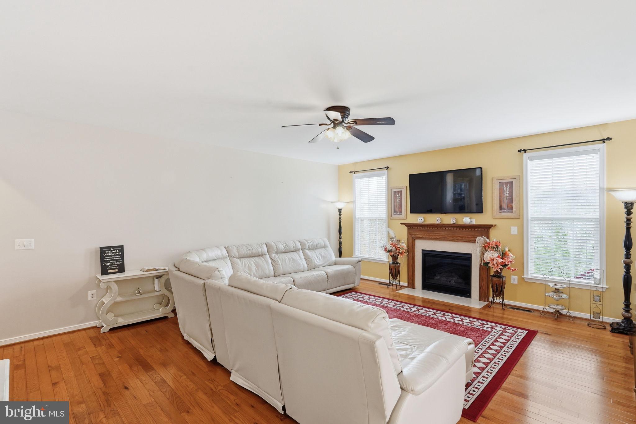 14 Smelters Trace Road Stafford, VA 22554 - Photo 24 of 78 a living room with furniture and a fireplace
