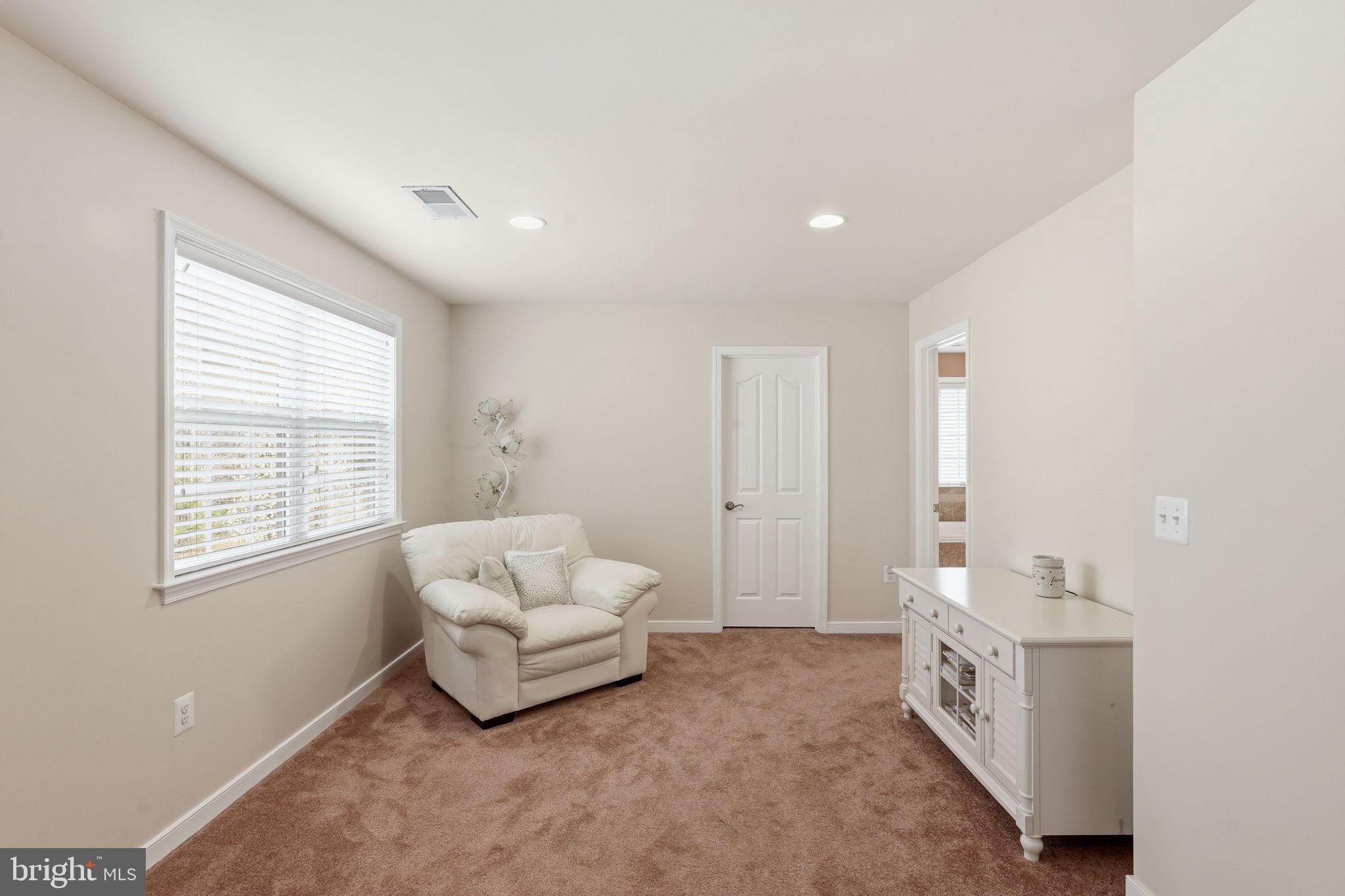 14 Smelters Trace Road Stafford, VA 22554 - Photo 37 of 78 a spacious bedroom with a bed and a window