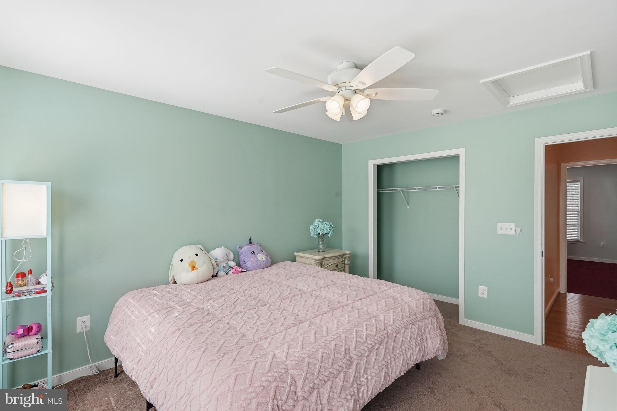 14 Smelters Trace Road Stafford, VA 22554 - Photo 44 of 78 a bedroom with a bed and a chandelier