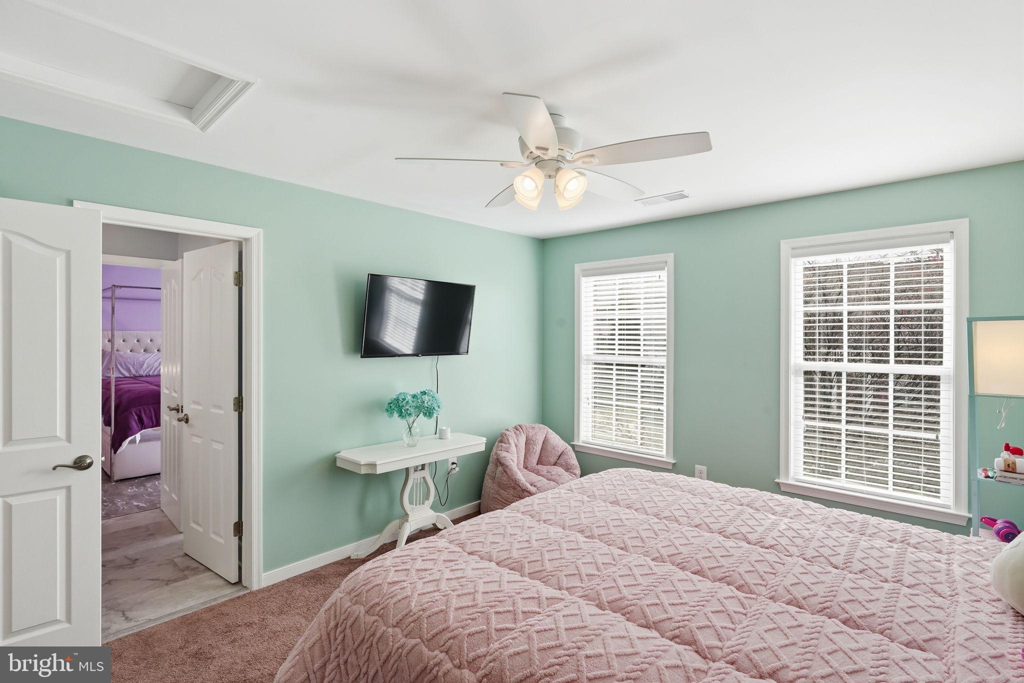 14 Smelters Trace Road Stafford, VA 22554 - Photo 46 of 78 a bedroom with a bed mirror on desk and a window