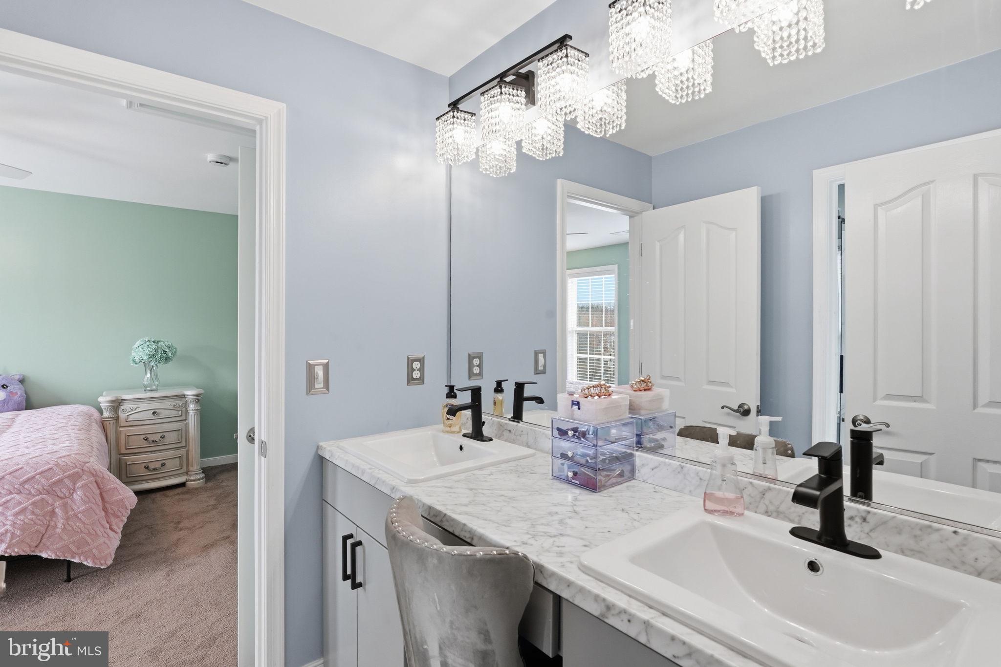 14 Smelters Trace Road Stafford, VA 22554 - Photo 47 of 78 a bathroom with a sink double vanity and a mirror
