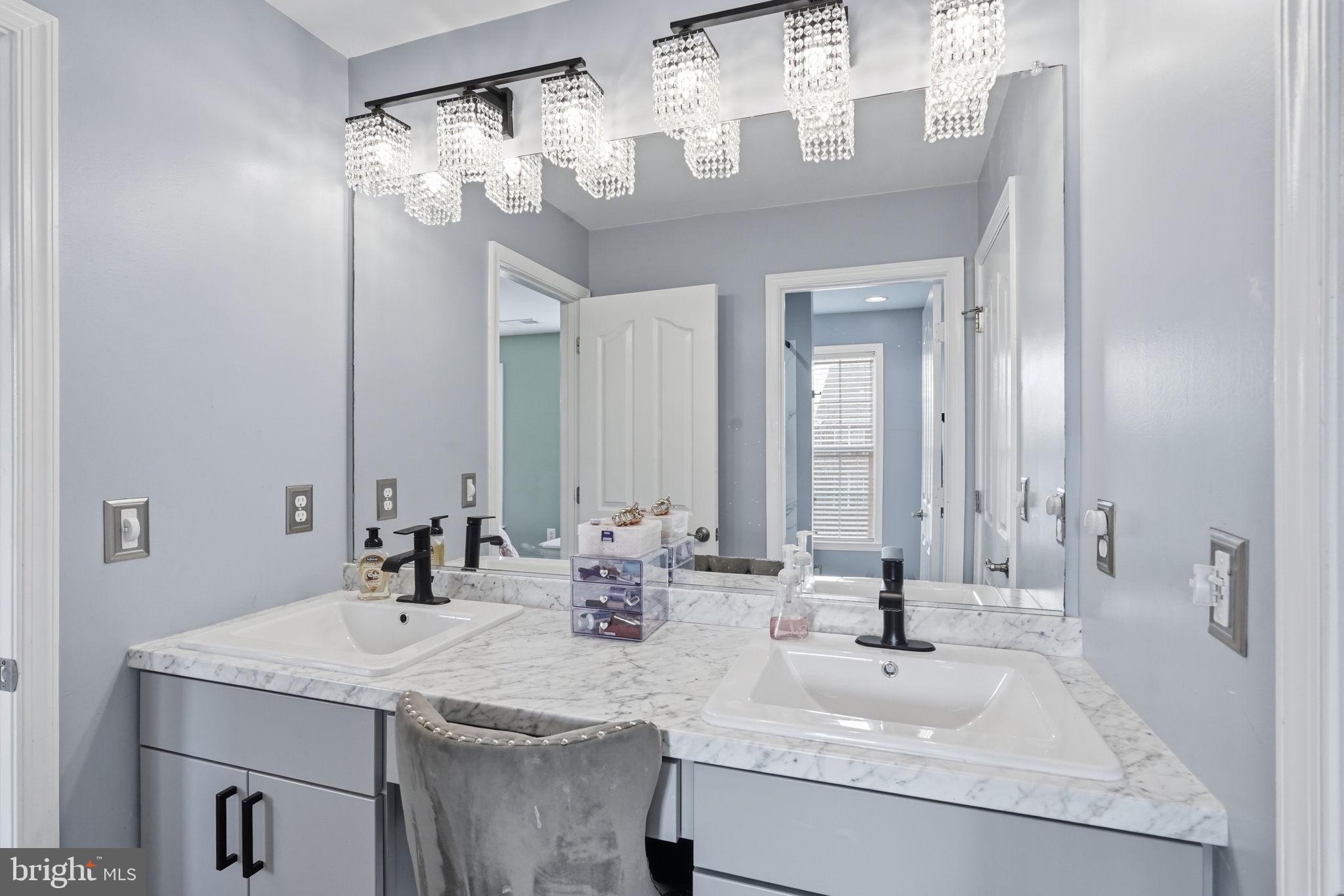 14 Smelters Trace Road Stafford, VA 22554 - Photo 48 of 78 a bathroom with a granite countertop sink a large mirror and vanity