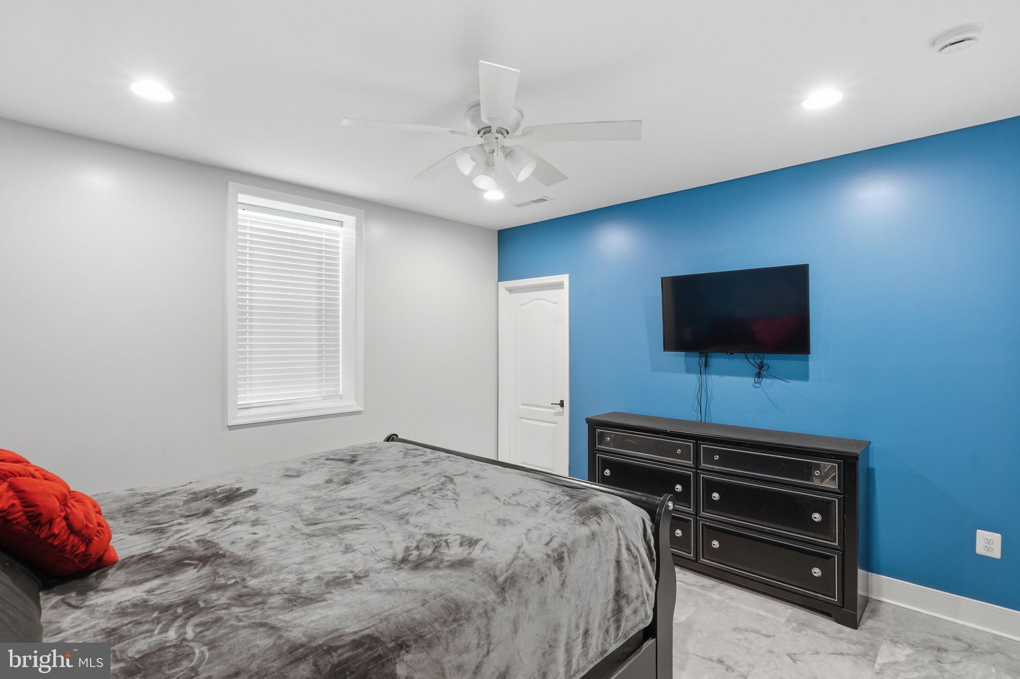 14 Smelters Trace Road Stafford, VA 22554 - Photo 60 of 78 a bedroom with a bed and a flat screen tv