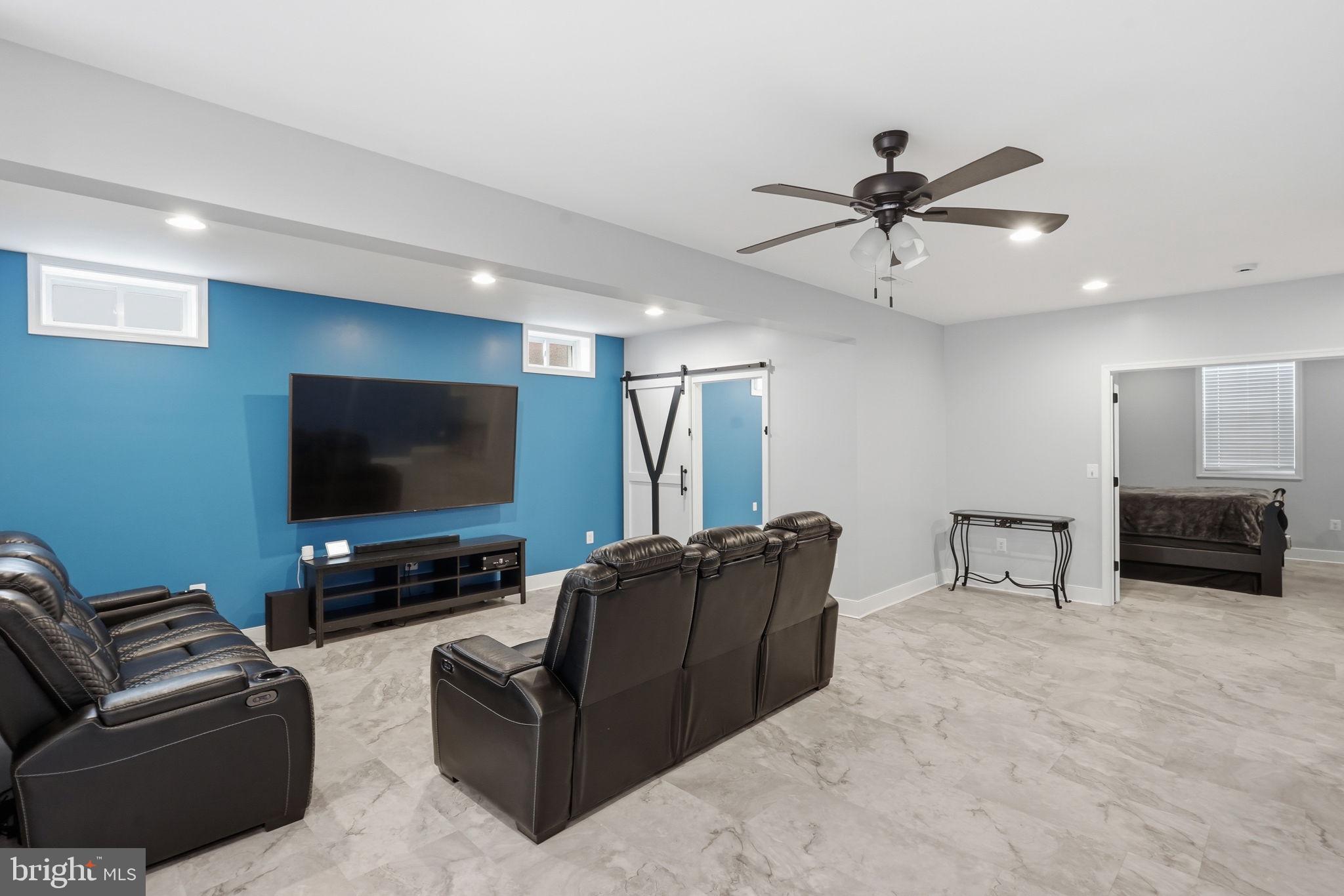 14 Smelters Trace Road Stafford, VA 22554 - Photo 61 of 78 a living room with furniture and a flat screen tv