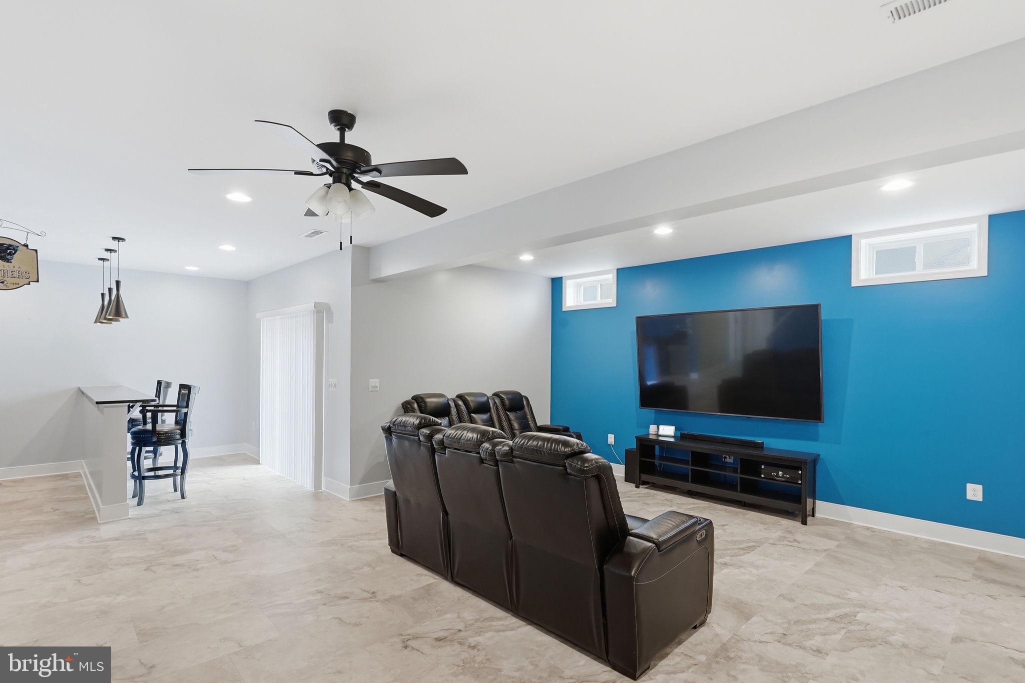 14 Smelters Trace Road Stafford, VA 22554 - Photo 62 of 78 a living room with furniture and a flat screen tv