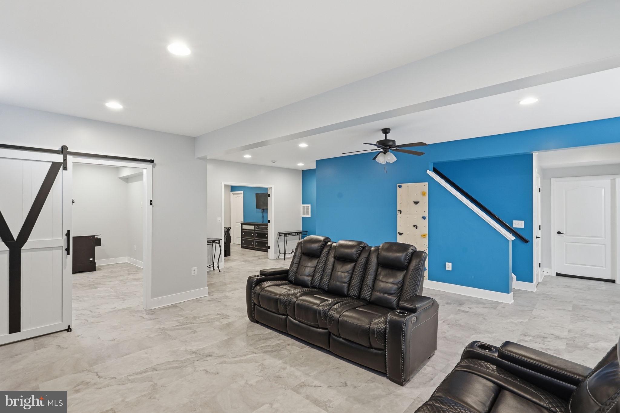 14 Smelters Trace Road Stafford, VA 22554 - Photo 63 of 78 a living room with furniture and a ceiling fan