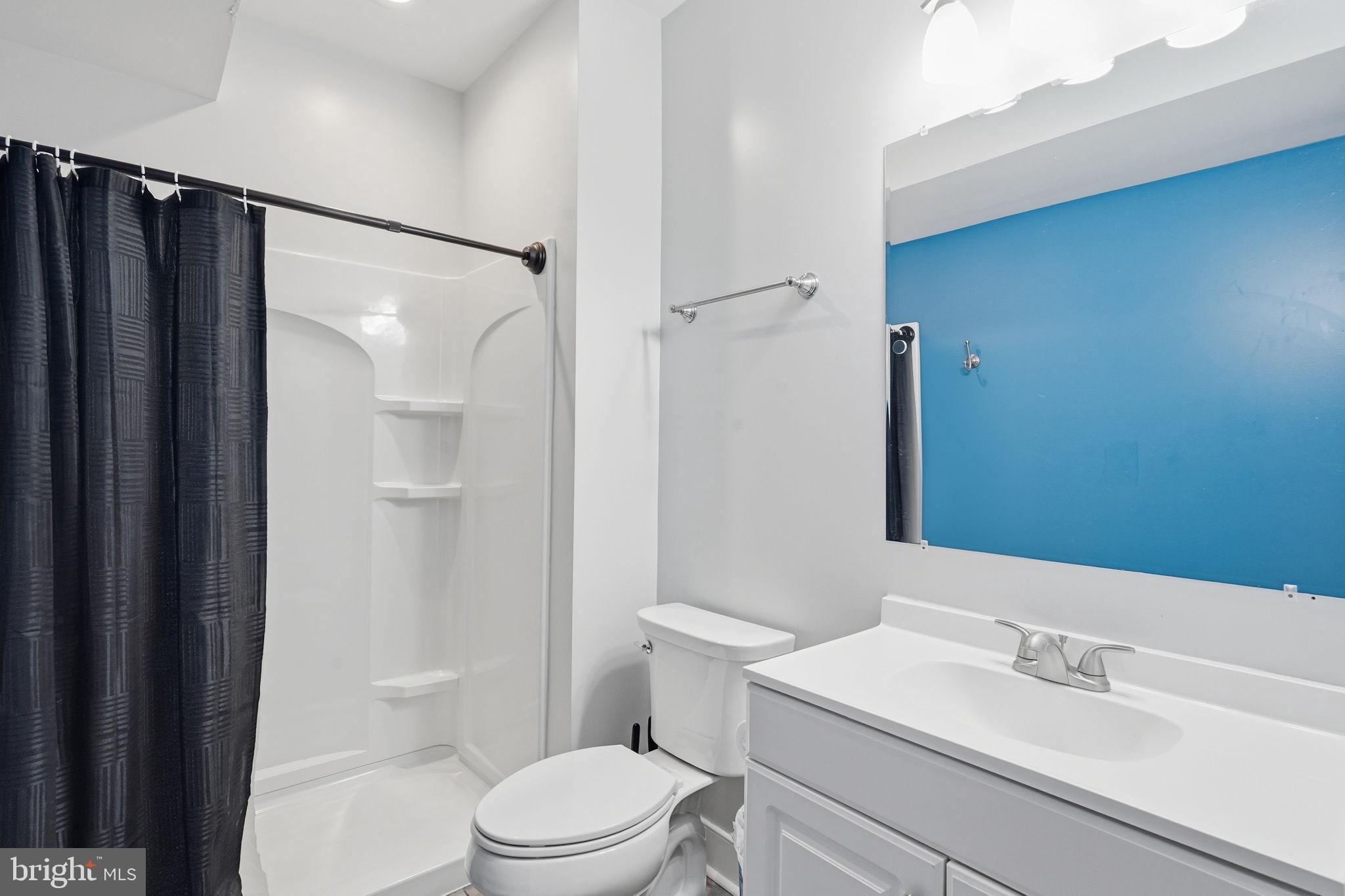 14 Smelters Trace Road Stafford, VA 22554 - Photo 67 of 78 a bathroom with a sink mirror vanity and toilet
