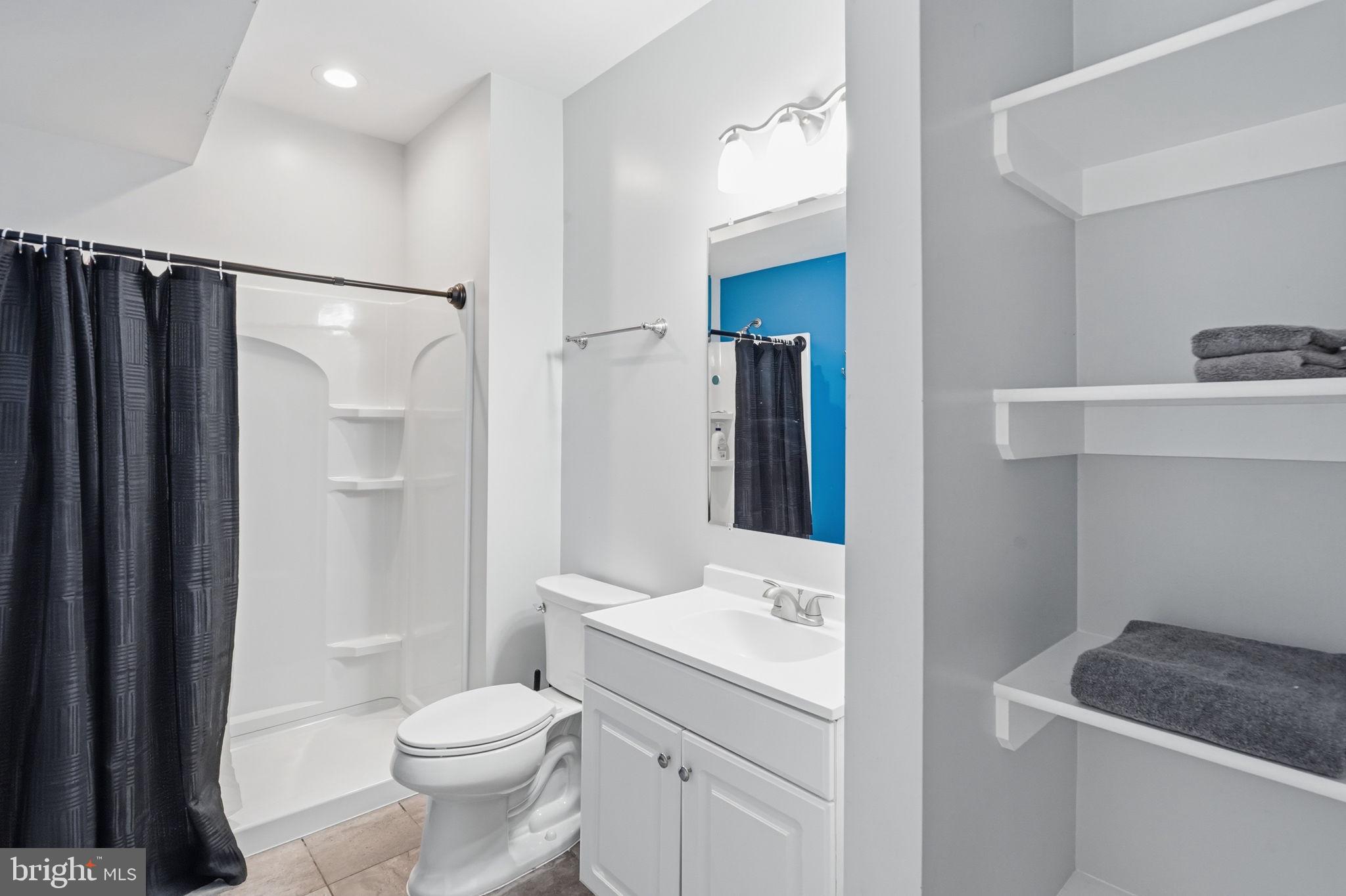 14 Smelters Trace Road Stafford, VA 22554 - Photo 68 of 78 a bathroom with a sink toilet and shower