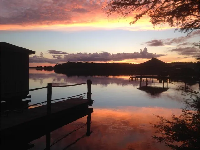 a view of a terrace with sunset view