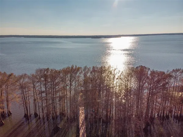 a view of a lake in middle of a house