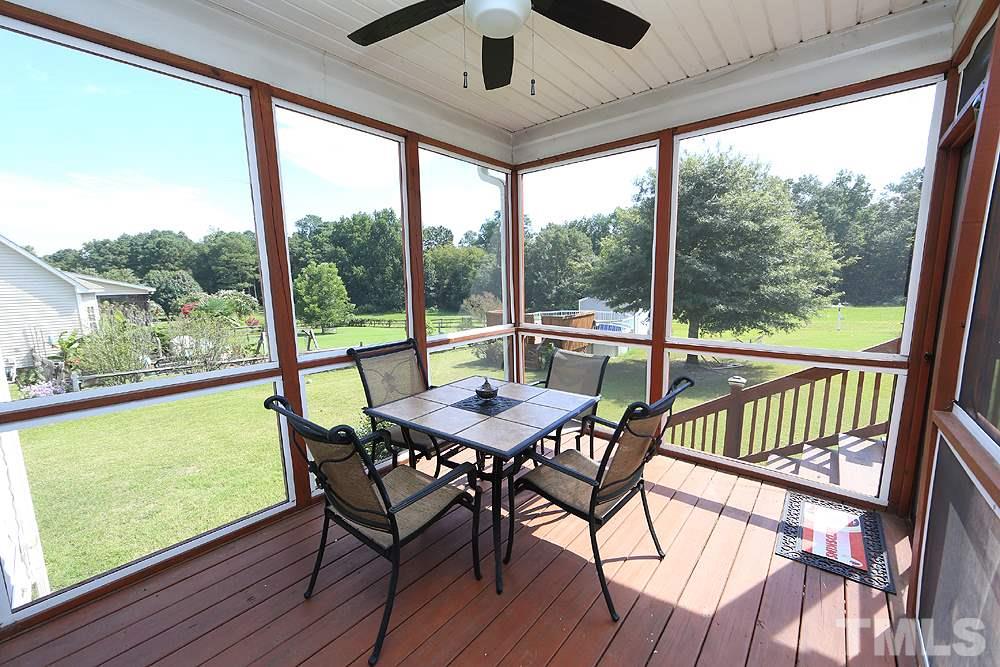 214 Steve Ridge Willow Spring, NC 27592 - Photo 14 of 29 a view of a room with a furniture and balcony