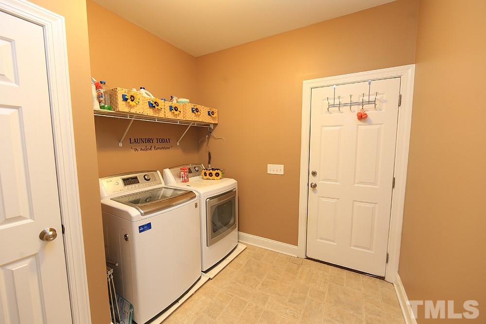 214 Steve Ridge Willow Spring, NC 27592 - Photo 18 of 29 a utility room with washer and dryer