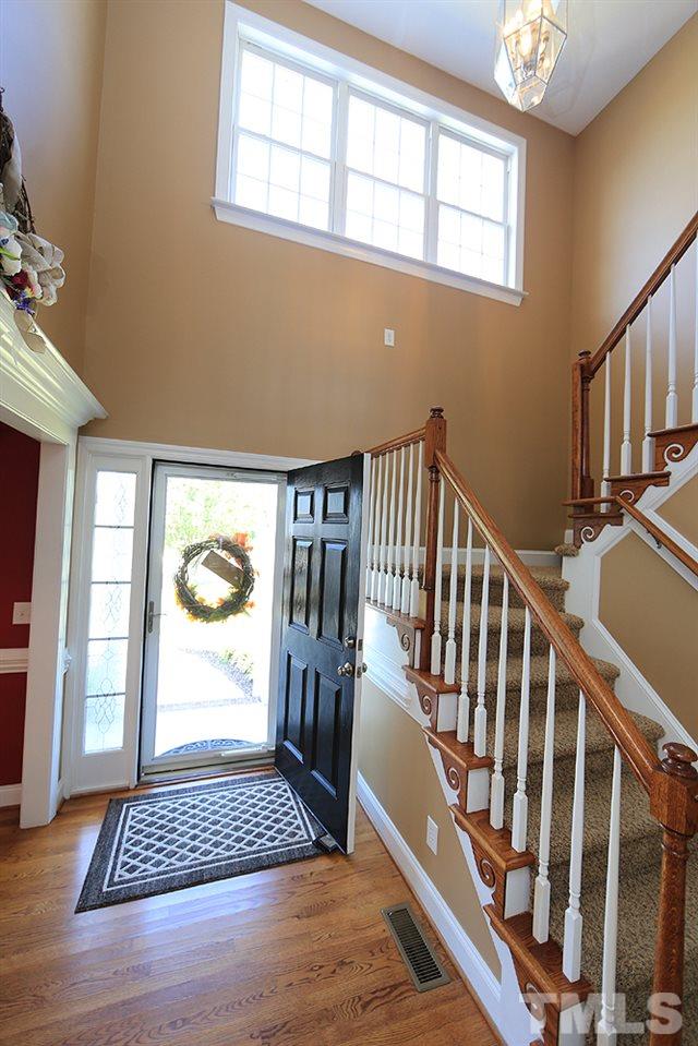 214 Steve Ridge Willow Spring, NC 27592 - Photo 3 of 29 a view of balcony and wooden floor