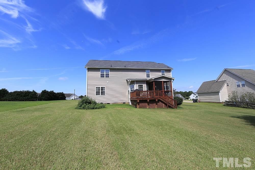 214 Steve Ridge Willow Spring, NC 27592 - Photo 25 of 29 a view of a house with backyard