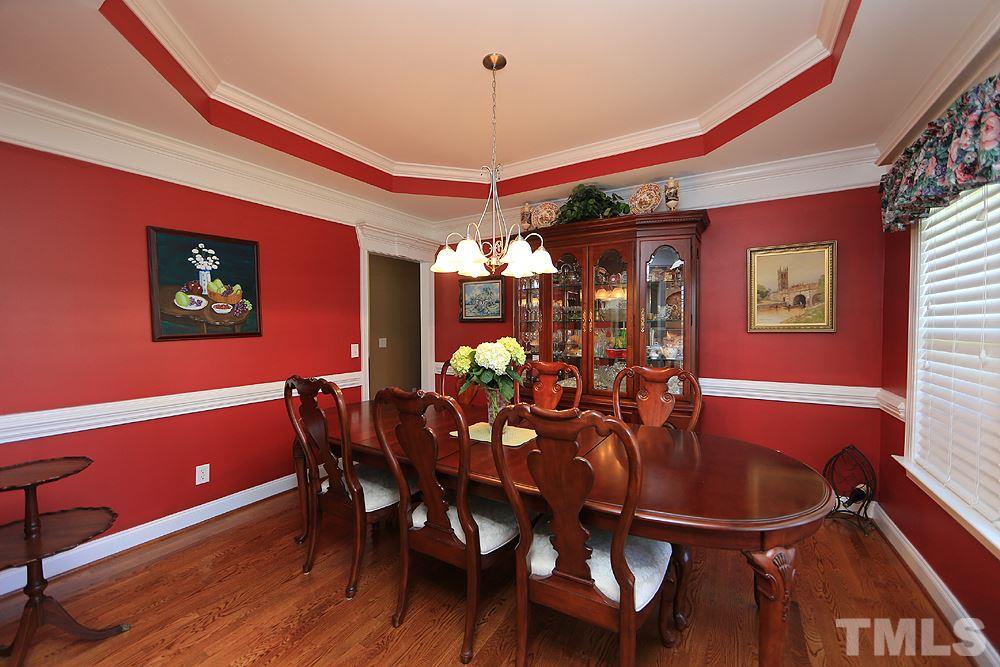 214 Steve Ridge Willow Spring, NC 27592 - Photo 5 of 29 a dining room with furniture and chandelier