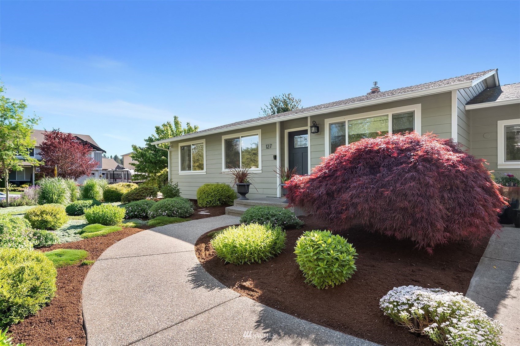 127 Hoquiam Avenue Southeast Renton, WA 98059 - Photo 1 of 26 front view of a house with a yard