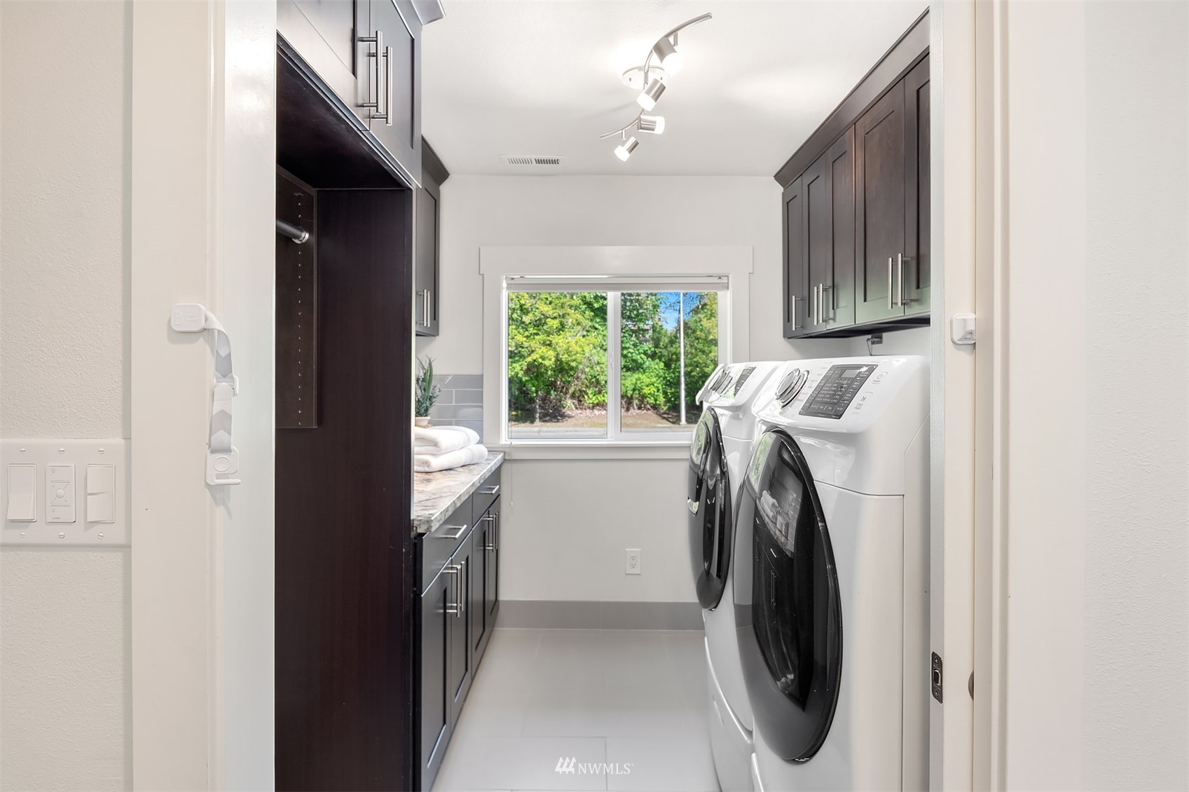 127 Hoquiam Avenue Southeast Renton, WA 98059 - Photo 17 of 26 a utility room with dryer and washer