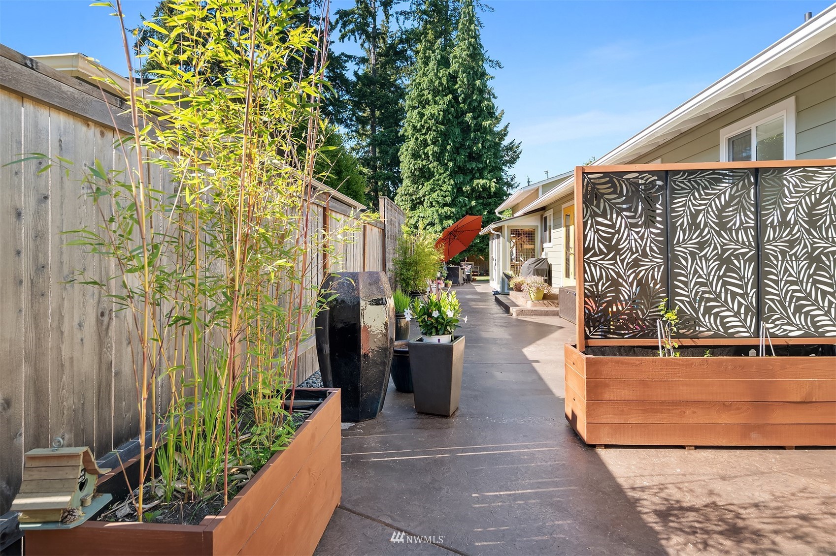 127 Hoquiam Avenue Southeast Renton, WA 98059 - Photo 19 of 26 a view of a street with potted plants