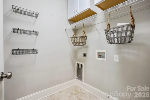 a bedroom with a bed and a ceiling fan