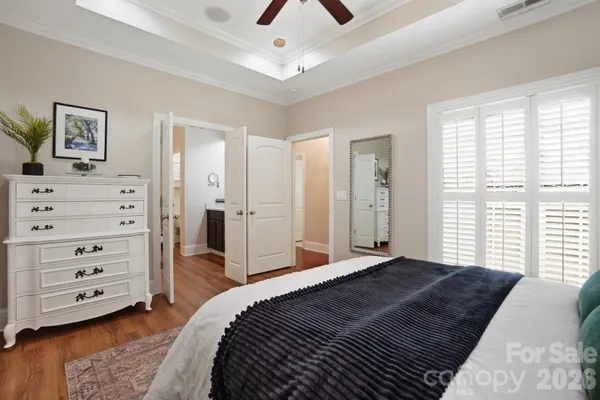 a spacious bathroom with a double vanity sink and a mirror