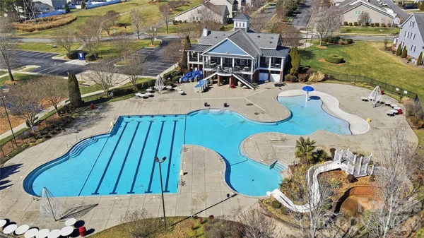 a view of swimming pool with a patio