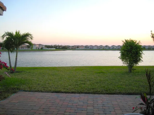 a view of a lake from a yard
