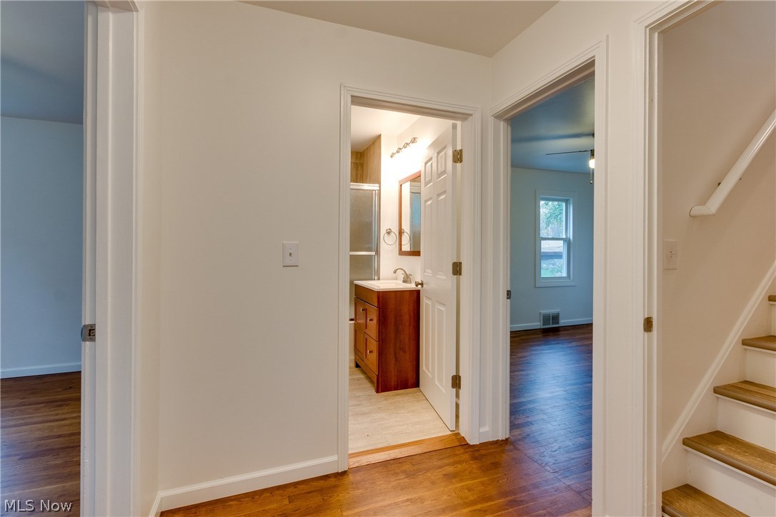 38705 Chardon Road Willoughby Hills, OH 44094 - Photo 26 of 35 Great view capturing bath with two bedrooms - one of either side of the bathroom and then the stairs going up to the 3rd bedroom....Shows the open layout