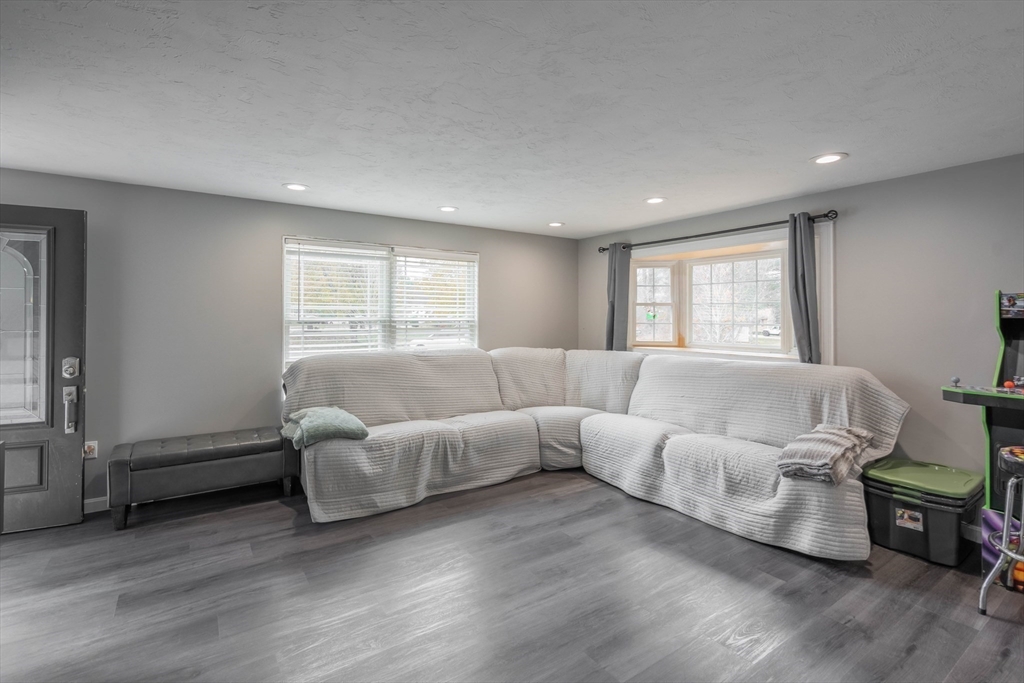 149 Dunnbrook Road East Brookfield, MA 01515 - Photo 13 of 34 a living room with furniture and a window
