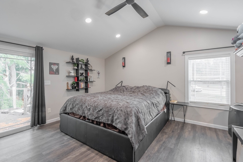 149 Dunnbrook Road East Brookfield, MA 01515 - Photo 20 of 34 a spacious bedroom with a large bed and a large window