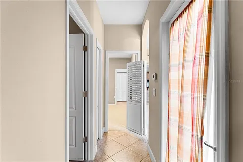 a view of a bathroom with bathtub and shower