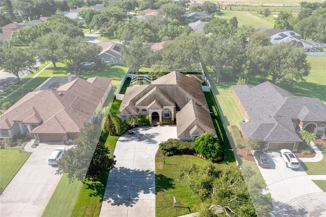 an aerial view of a house with a garden
