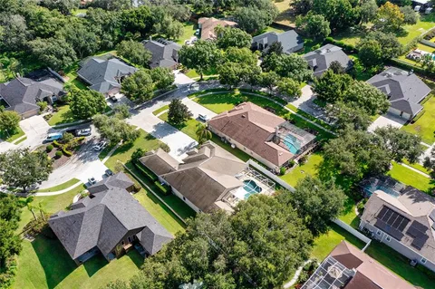 an aerial view of a house with a garden