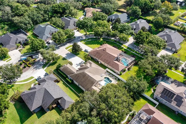 an aerial view of a house with a garden