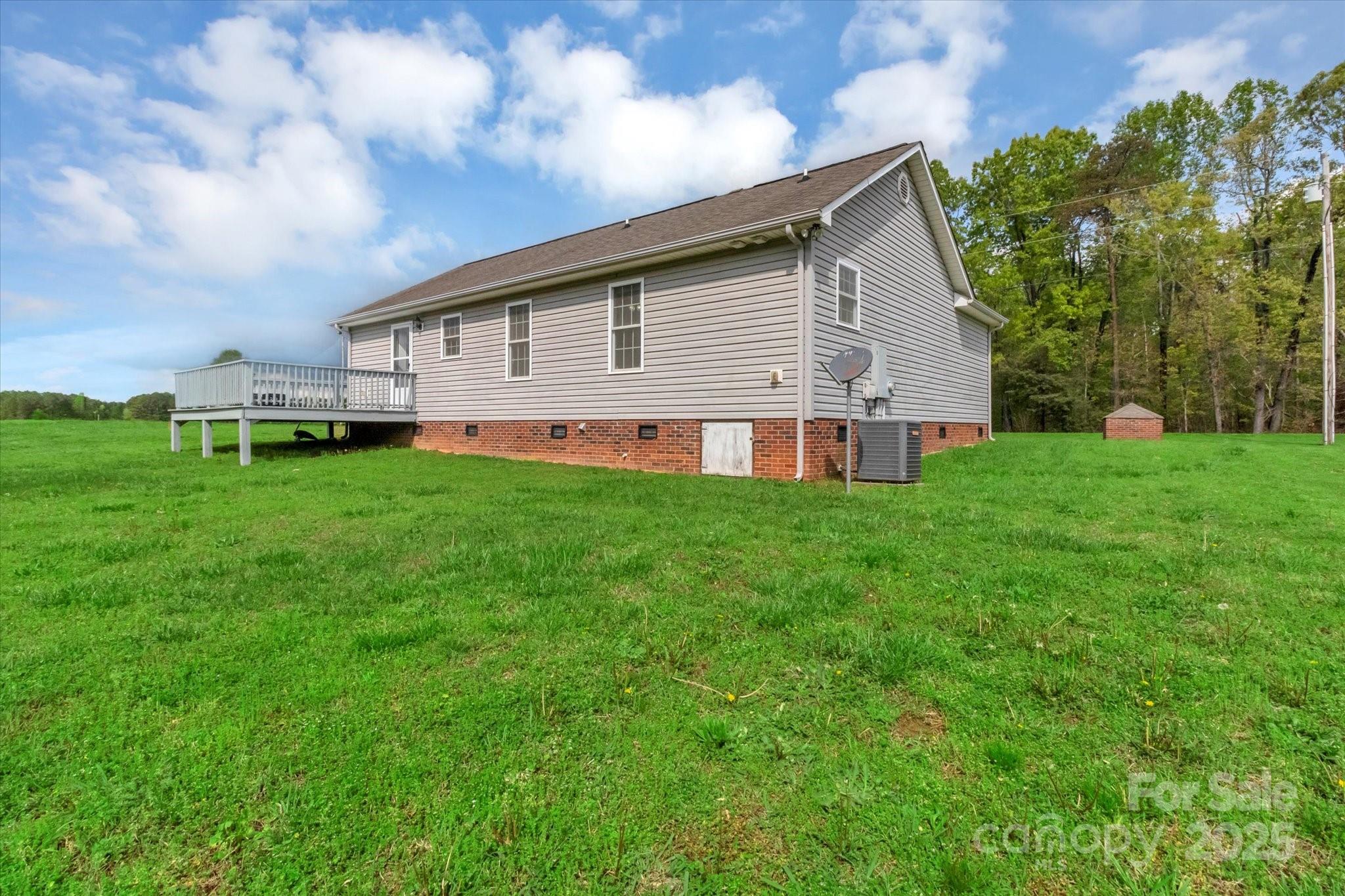 4773 Westwinds Road Lincolnton, NC 28092 - Photo 4 of 38 a view of a house with a yard and sitting area