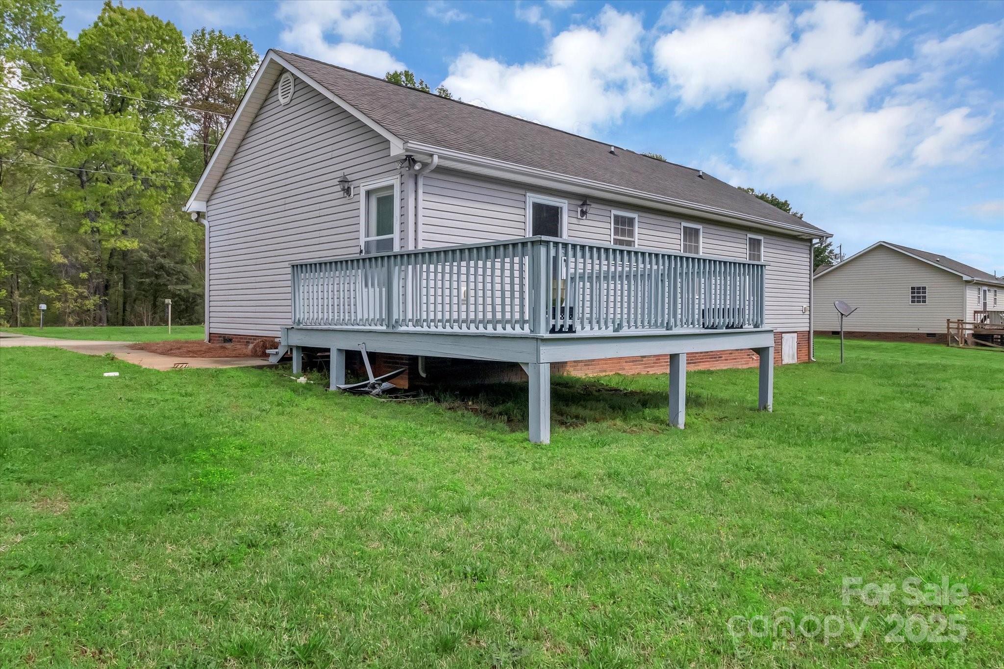 4773 Westwinds Road Lincolnton, NC 28092 - Photo 6 of 38 a view of a house with a yard and sitting area