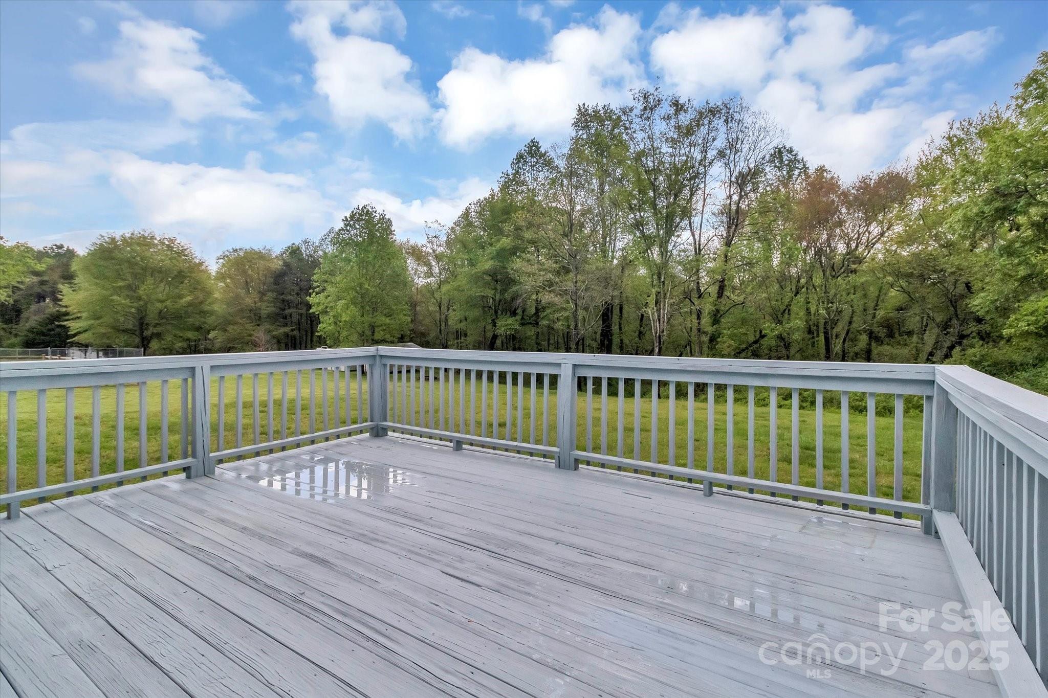 4773 Westwinds Road Lincolnton, NC 28092 - Photo 7 of 38 a view of a balcony with wooden floor