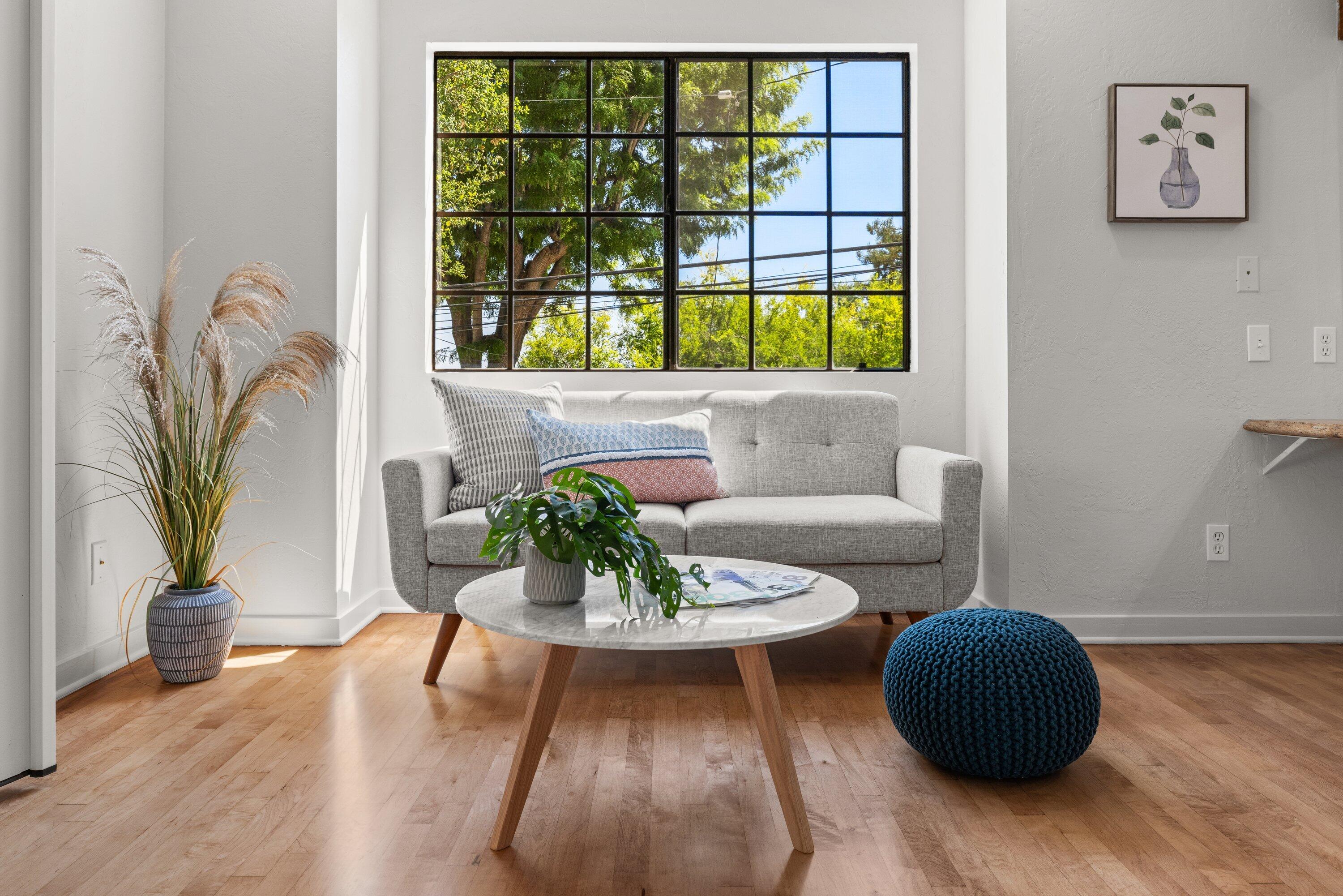 844 Cheltenham Road Santa Barbara, CA 93105 - Photo 11 of 31 a living room with furniture and a potted plant